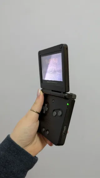 Nintendo GameBoy Advance SP Nero + pokemon zaffiro