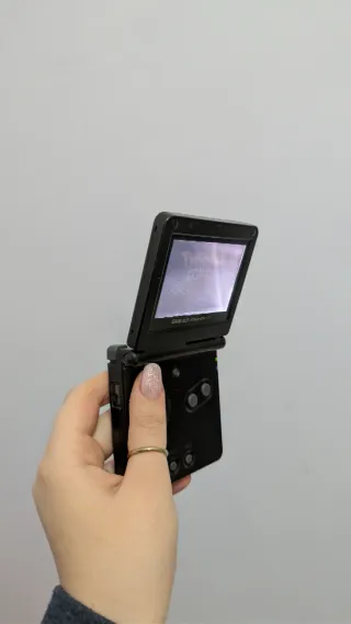 Nintendo GameBoy Advance SP Nero + pokemon zaffiro