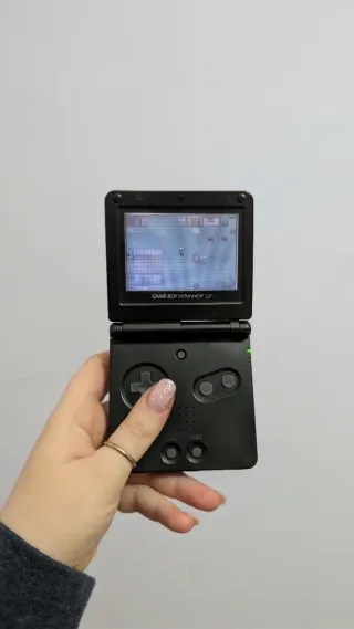 Nintendo GameBoy Advance SP Nero + pokemon zaffiro