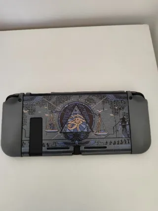 Nintendo Switch V2 (versione 2019 con prefisso XKJ) con custodia, scheda micro SD 64 GB e accessori