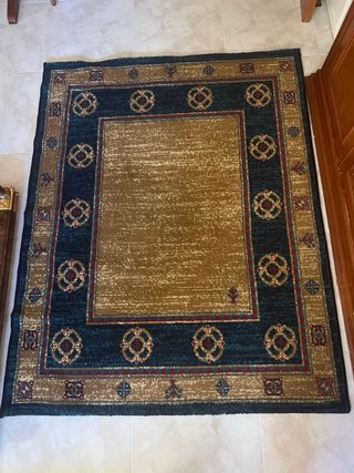 Tappeto blu e giallo con design