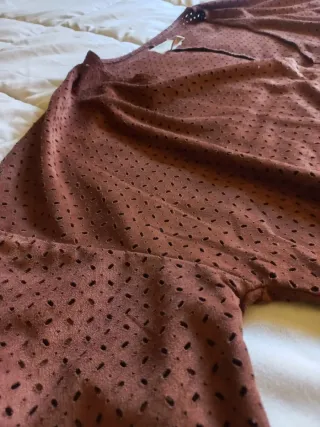 Chaleco marrón perforado con flecos talla M