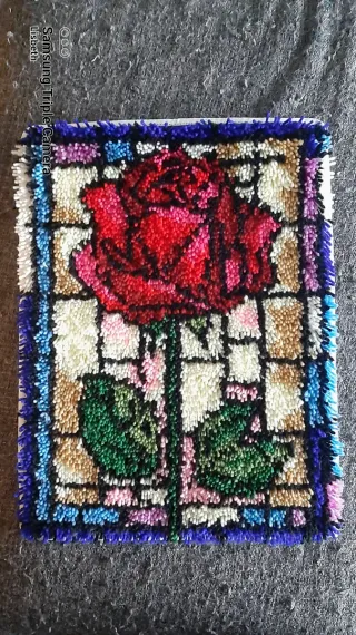 Alfombrilla de tela con rosa roja