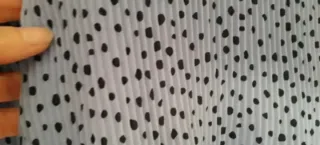 Blusa azzurro a pois neri