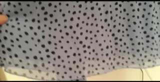 Blusa azzurro a pois neri