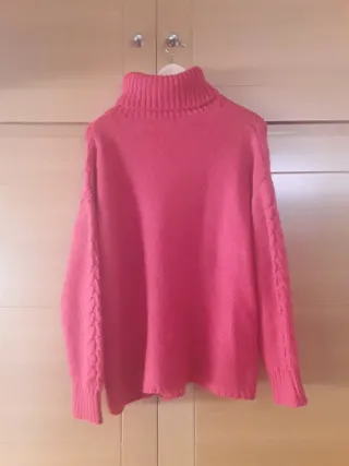 Jersey Primark rosa trenzado cuello alto