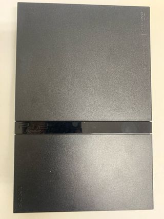 Playstation 2 con juegos y micrófonos