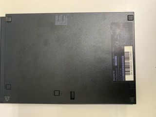 Playstation 2 con juegos y micrófonos