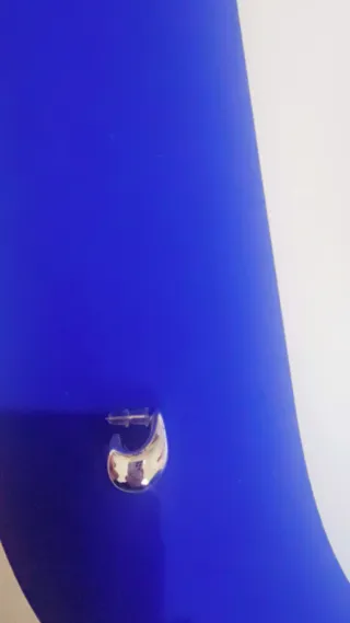 Pendientes unisex plateados