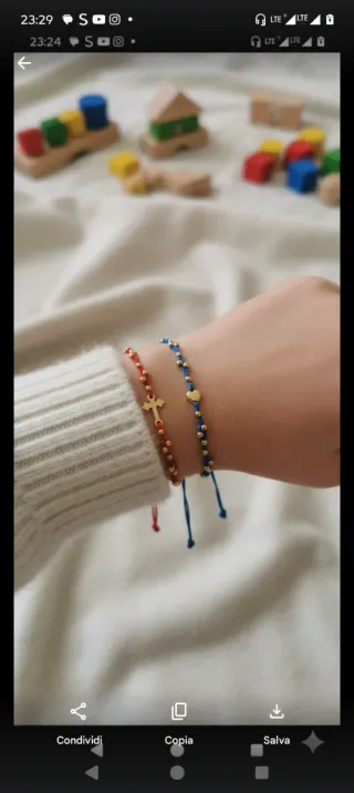 Braccialetto con ciondolo a forma di cuore e croce