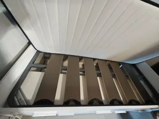 Cama individual con varios cajones