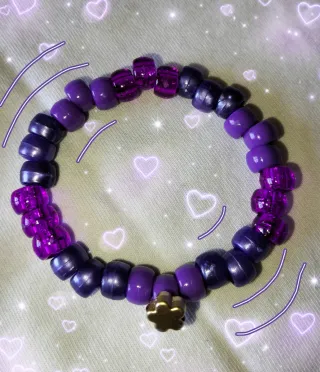 Pulsera Kandi Morada con Charm Flor