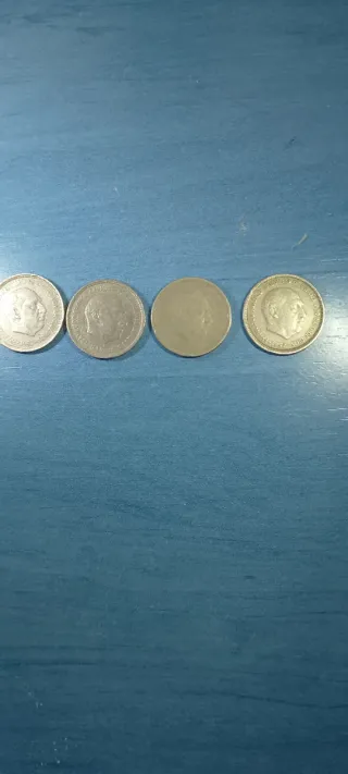 25 Monedas del Rey y de Franco tengo 4 de 5p.1957