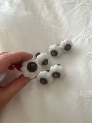 Maniglie per armadi bianche e bronzo