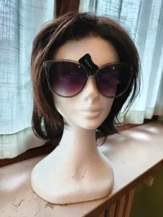 Occhiali da sole Naj Oleari lenti lilla