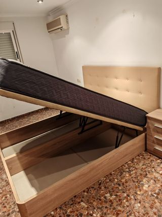 Cama individual con cabecero y mesita