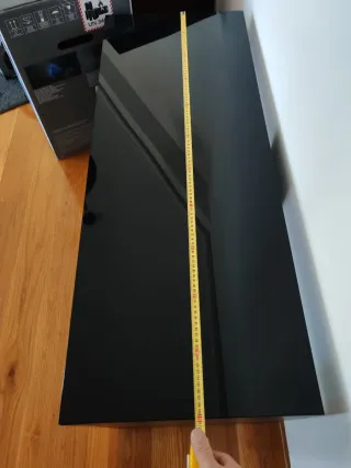 Mueble de salón negro y cristal