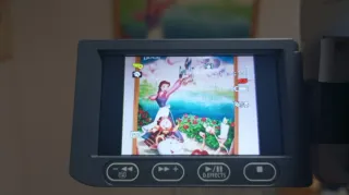 Videocámara Canon DVD plateada y negra