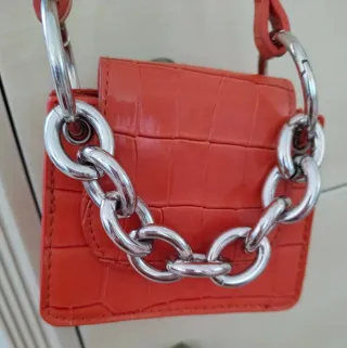 Bolso naranja efecto piel cocodrilo