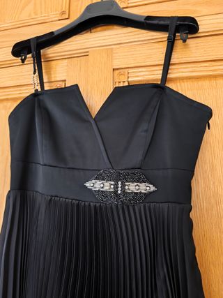 Vestido negro con flecos