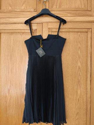 Vestido negro con flecos