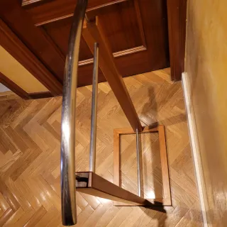 Galan de ropa de madera y metal