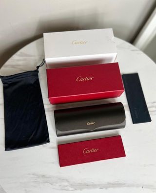 Gafas de sol Cartier doradas y marrones