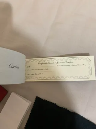 Gafas de sol Cartier doradas y marrones