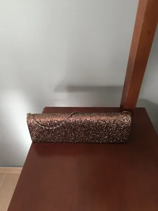 Bolso de fiesta dorado brillante