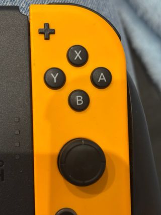 Mando Nintendo Switch Morado y Naranja