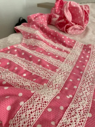 Traje de flamenca rosa lunares