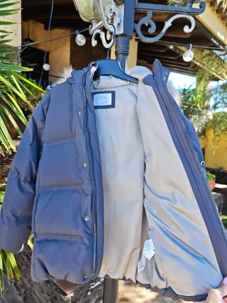 Plumífero Zara con capucha y pelo