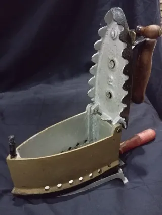 Plancha antigua de carbón