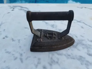 Plancha antigua de hierro