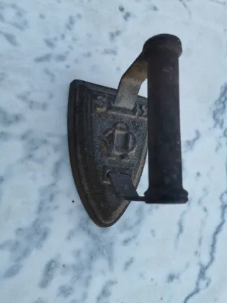 Plancha antigua de hierro