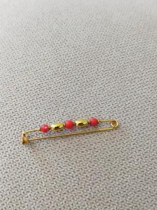 Spilla oro e corallo