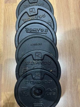 Banco de pesas + barras y mancuernas