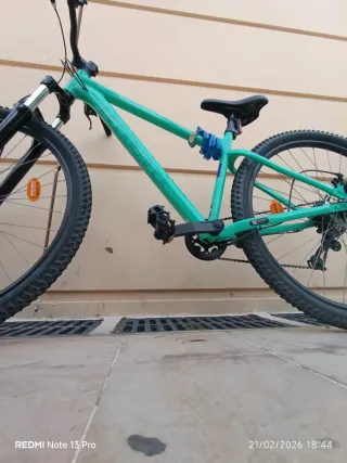 Bici Decathlon verde con cadena