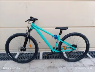 Bici Decathlon verde con cadena