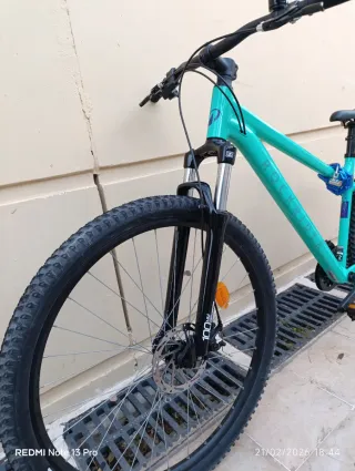 Bici Decathlon verde con cadena