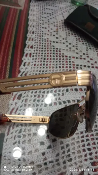 Gafas de sol Sergio Tacchini doradas y verdes