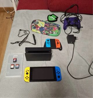 Nintendo Switch + 4 juegos + accesorios