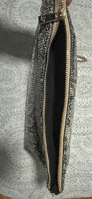 Bolso de fiesta Sfera negro y dorado.