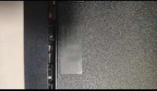 PS3 Slim + Mando Rojo + Assassin's Creed II