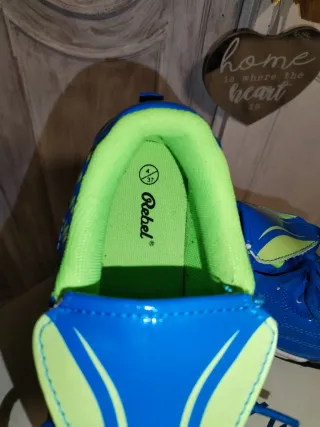 Botas de fútbol niño/niña  azul y verde