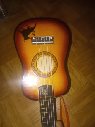 Guitarra con correa