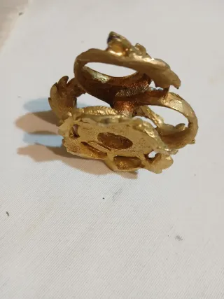 Antiguo soporte bronce pintalabios