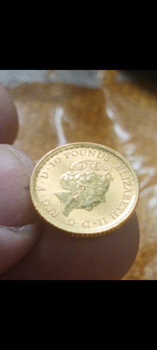 Moneda décimo oro brittania