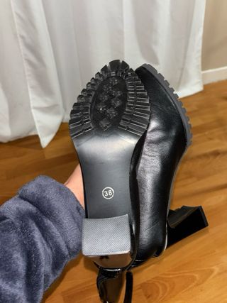 Botas altas negras con cremallera