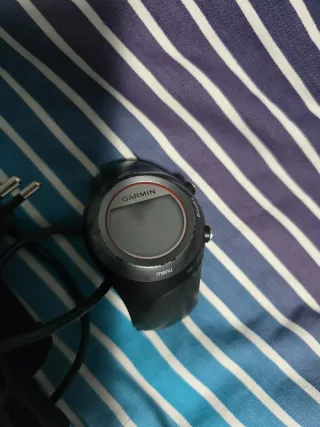 Garmin forerunner 410 y cargador pinza reloj Garmi